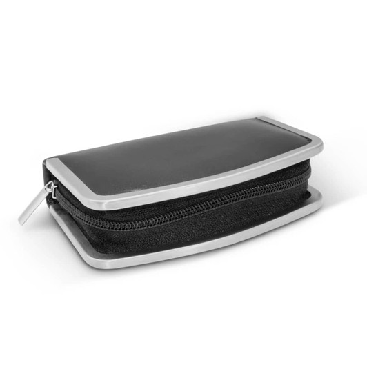 A manicure set in a sleek, black zippered case with a metallic frame.