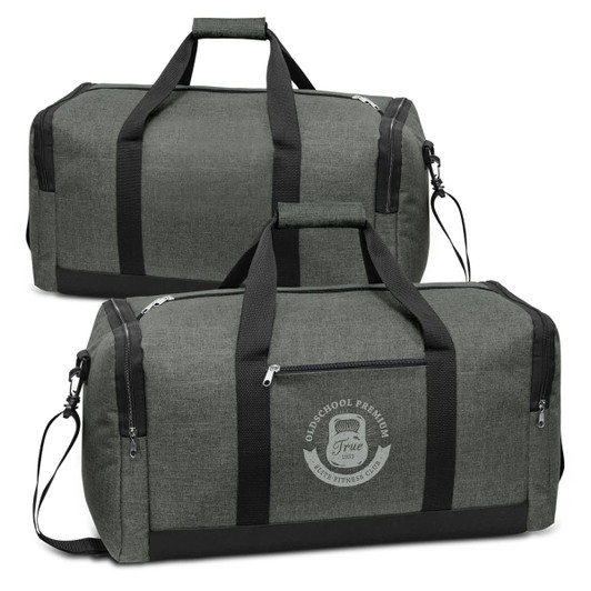 A green duffle bag featuring a logo, with black straps and zippers, designed for various uses.
