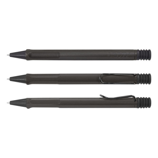 Three Lamy Safari Pens in a dark green color, featuring a plastic body, ergonomic grip, and metal clip.