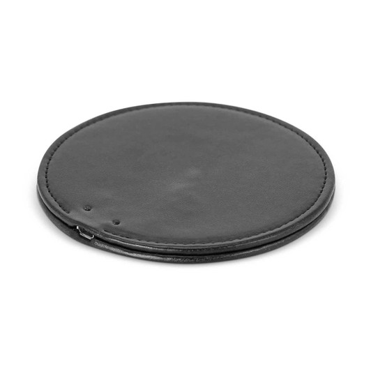 A round, black wireless charger with a smooth surface and a micro USB port.
