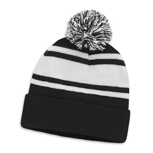 A black and white striped beanie with a pom pom on top. Features a knitted design and a folded brim.