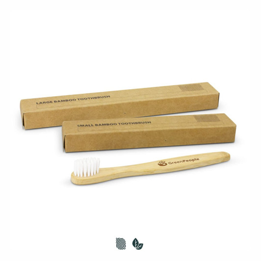 A bamboo toothbrush with a wooden handle and white bristles, accompanied by two brown cardboard boxes.