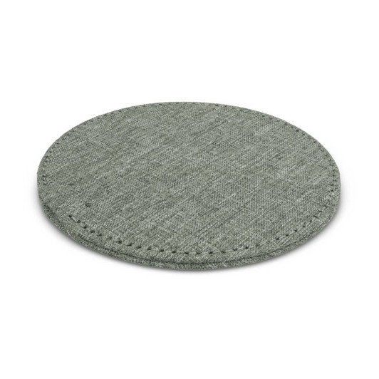 A round, fabric-covered wireless charger in a muted green shade with stitched edges.