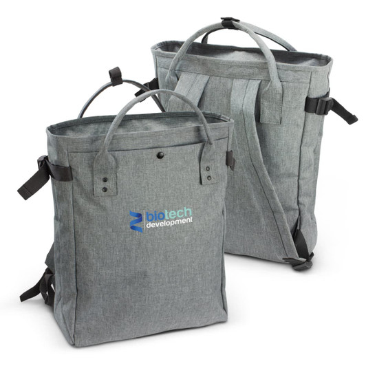 A grey tote backpack with dual handles and adjustable straps. Features a branding logo on the front.