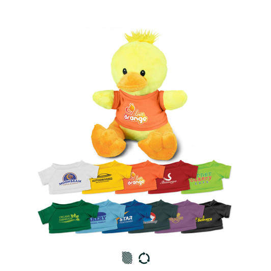 A yellow duck plush toy wearing an orange shirt, surrounded by various small colourful shirts in different hues.
