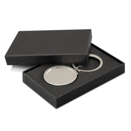A drink bottle opener key ring in a sleek silver finish, presented in a black gift box.
