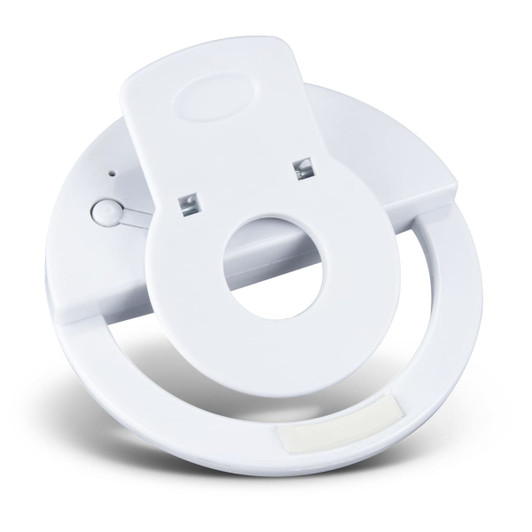 A white selfie phone light with a circular design and a slot for attachment, featuring a small logo.