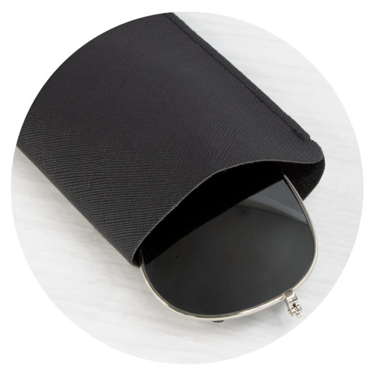 A black sunglass pouch partially covering a pair of dark sunglasses, featuring a logo.