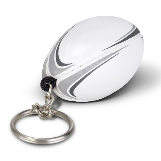 A rugby ball-shaped key ring in white with grey detailing, attached to a metal keyring. Features a logo.