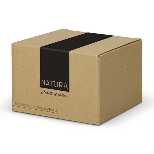 A brown cardboard box featuring a black stripe and logo, containing a NATURA bamboo mortar and pestle.
