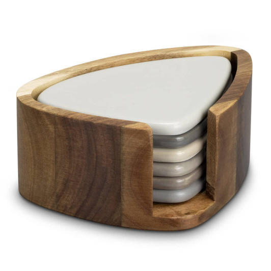 A triangular wooden coaster holder presents a set of five pebble coasters in earthy tones.