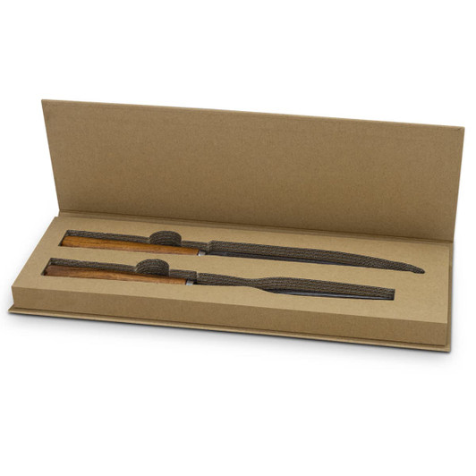 A wooden keepsake carving set in a brown gift box with two knives and protective sheaths.