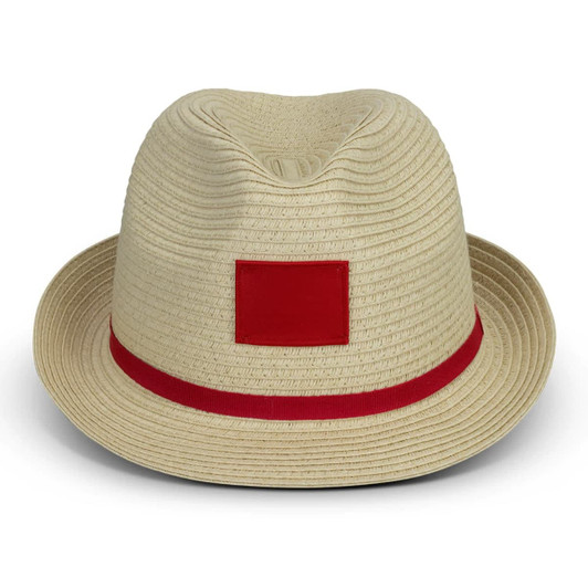 A cream fedora hat with a red band and a square patch, featuring a textured design.