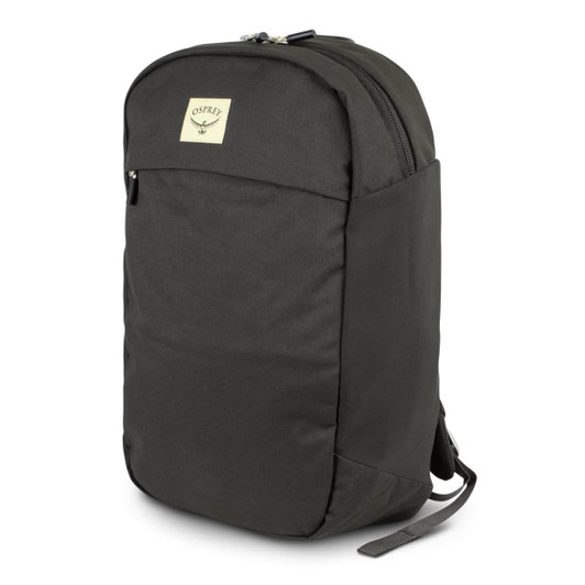 A dark green backpack with a logo on the front, featuring a slim design and zippered compartments.