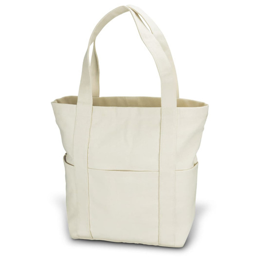 A beige canvas tote bag with two sturdy handles and an exterior pocket. It has a simple design and is unadorned.