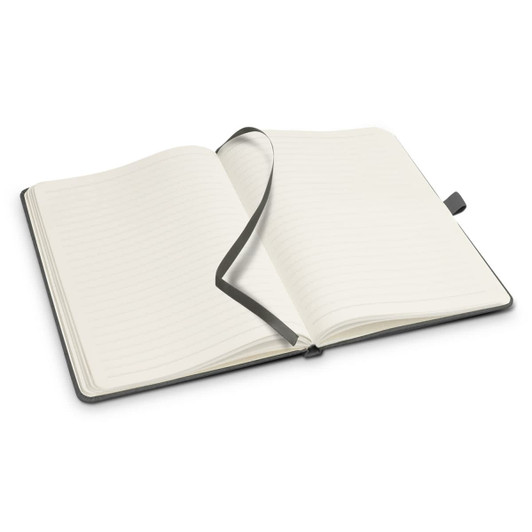 An open Petros Stone Paper Notebook in black, featuring lined pages and a matching ribbon bookmark.