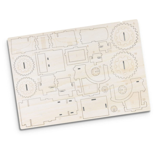A wooden model kit featuring laser-cut components including gears and various structures, ready for assembly.
