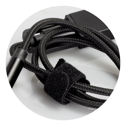 A braided charging cable in black, featuring a velcro tie for organisation and a connector at the end.