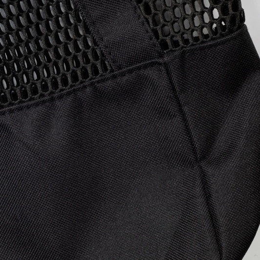 A black sports tote with a mesh design and sturdy straps, featuring a logo on the material.