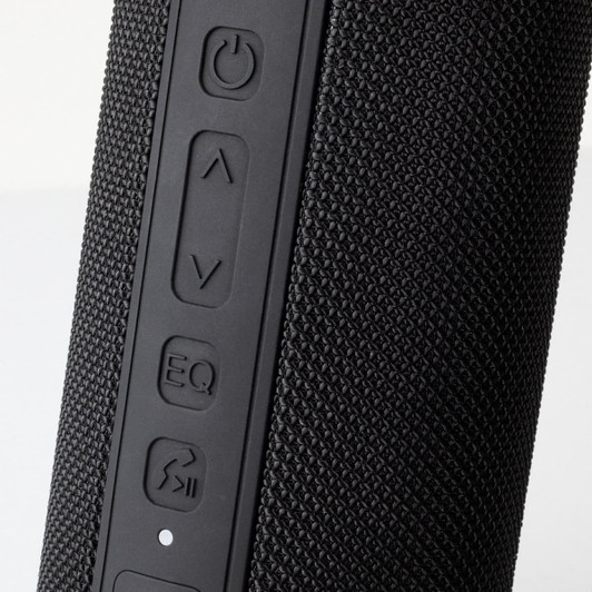 A black Bluetooth speaker featuring textured material and control buttons on the side. Contains a branding logo.