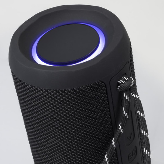A cylindrical black Bluetooth speaker with a glowing blue light and textured surface, featuring a strap on one side.