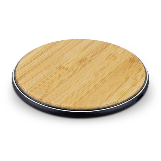 A round, bamboo wireless fast charger with a sleek black base.