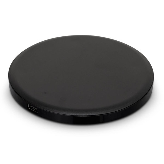 A round black wireless charger with a sleek design, featuring a USB port.