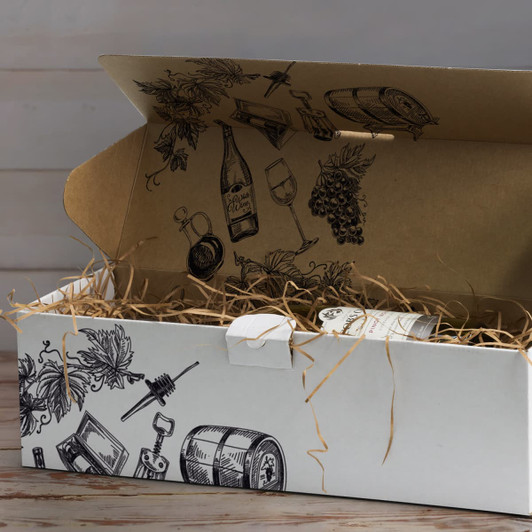 A white die cut box with a locking lid, featuring illustrations of wine-related items and filled with shredded kraft paper.