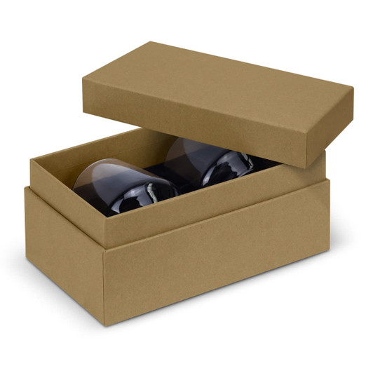 A boxed set of two dark-coloured whiskey glasses in a simple, brown packaging.