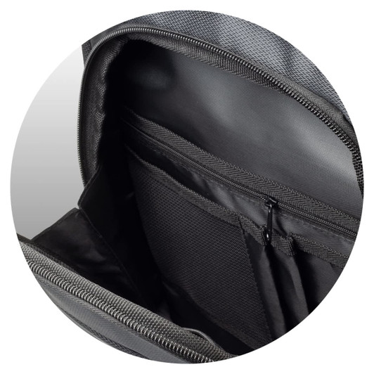 A close-up of the interior of a grey backpack featuring multiple pockets and a zippered compartment.