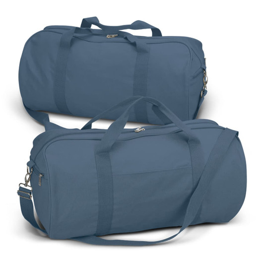 A canvas duffle bag in a deep blue shade, featuring dual handles and a detachable shoulder strap. It has a small front pocket and a logo.