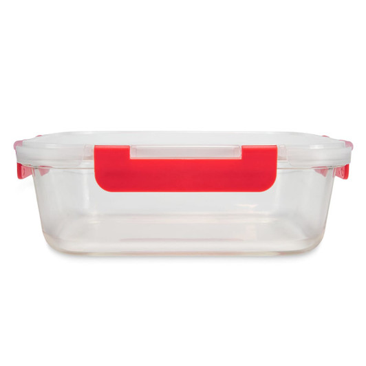 A clear lunch box with red accents and a secure lid, suitable for storing food items.