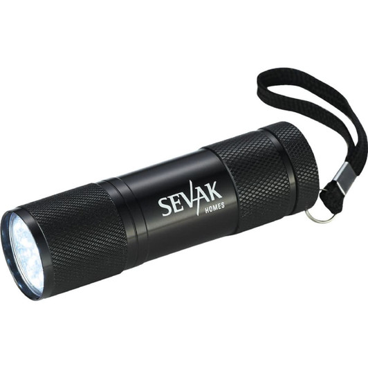 A black LED flashlight with a textured grip and a wrist strap, featuring a logo on the side.