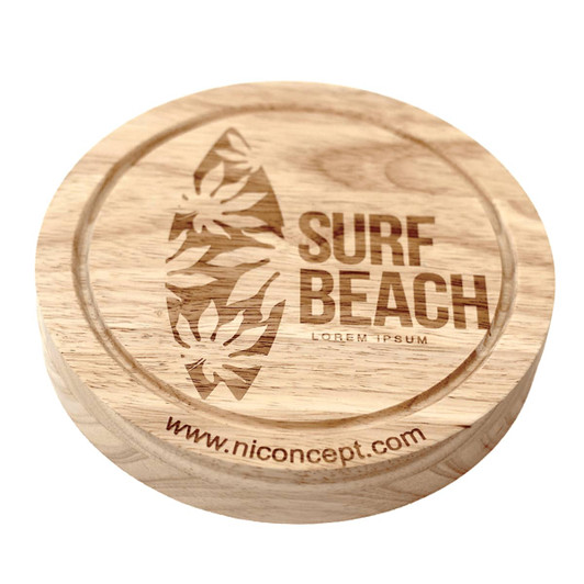 A round wooden cheese board featuring a surfboard design and floral accents, with an engraved logo.