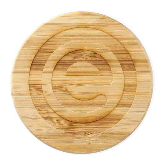 A bamboo lid featuring a circular design, crafted from light brown bamboo wood. Suitable for a glass cup.