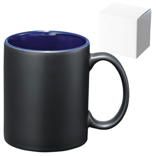 A ceramic mug with a matte black exterior and a glossy navy blue interior, accompanied by a white box.