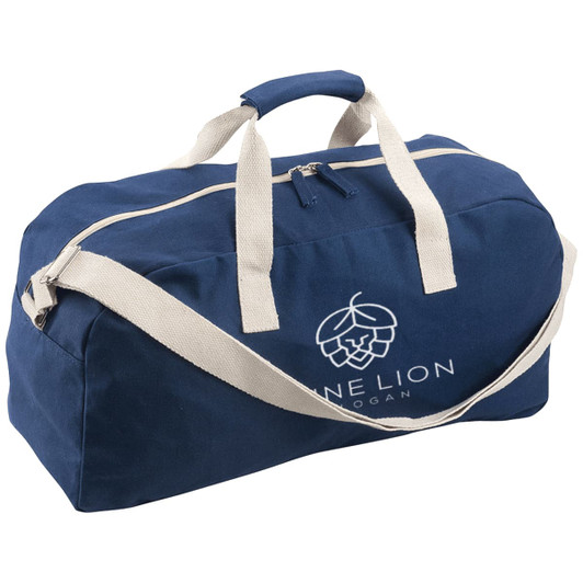 A navy blue duffle bag with cream handles and a logo on the front. It features a zip closure and shoulder strap.