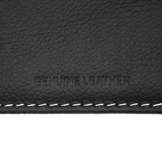 A close-up of a black leather texture featuring embossed text "Genuine Leather" and white stitching.