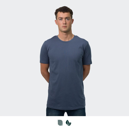A plain navy blue men's t-shirt with a round neckline, worn by a model standing upright. Features a logo.