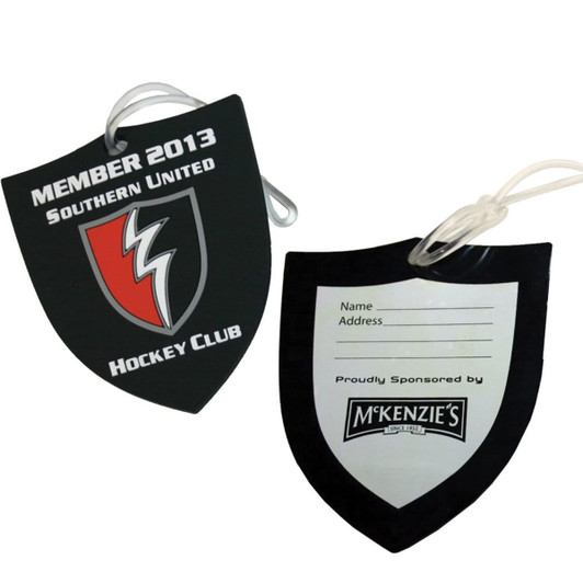 Custom-shaped PVC luggage tag in black and red, featuring a logo and space for personal information on the back.