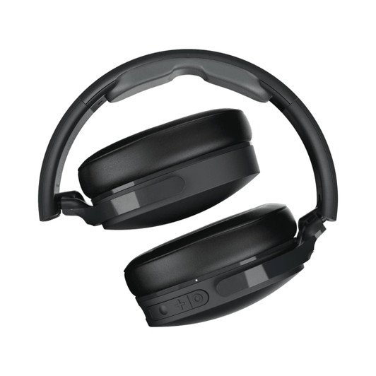 A pair of black wireless headphones with a sleek design and adjustable headband, featuring a logo on the side.