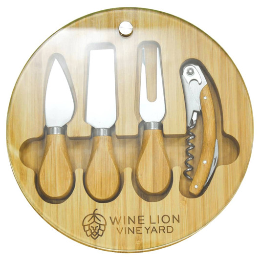 A round bamboo cheese board set featuring three cheese knives and a corkscrew, all with wooden handles.