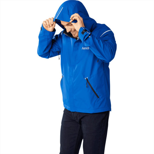 A blue men's softshell jacket with a hood, featuring zippers and a logo on the chest.
