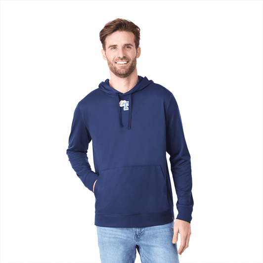 A navy hooded jumper with a front pocket and a logo on the chest. The model is smiling and wearing denim jeans.