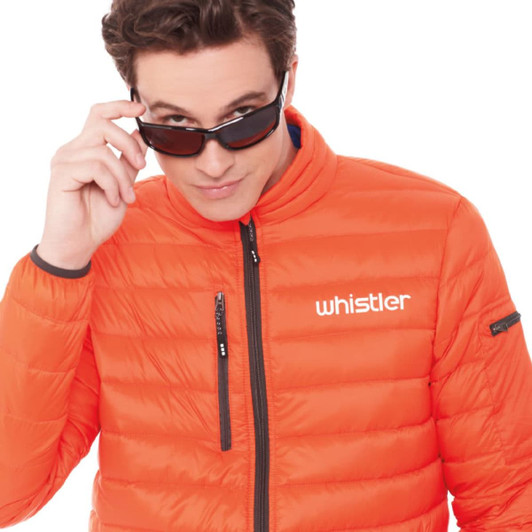 An orange puffer jacket with a zippered front and a logo, worn by a model adjusting sunglasses.