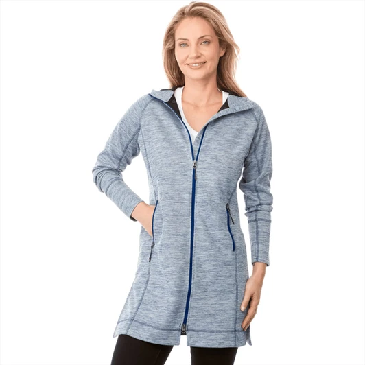 A woman wearing a blue Odell Knit Zip Hoody, featuring a zip closure and pockets. The hoodie has a stylish design.