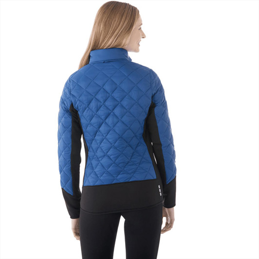 A women's hybrid insulated jacket featuring a blue quilted design with black accents and a collar. It has a logo.