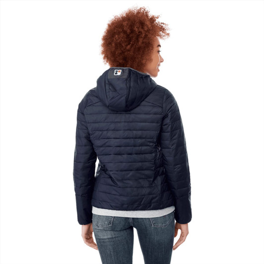 A women's packable insulated jacket in navy blue, featuring a hood and a logo on the back.