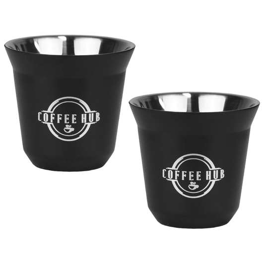 A set of two black espresso cups with a stainless steel interior, featuring a logo on the front.