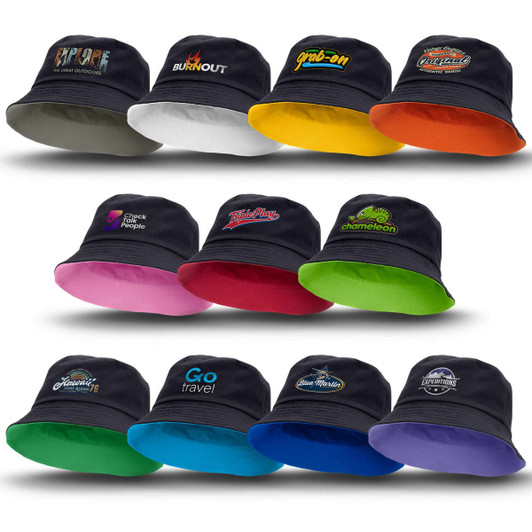 A collection of reversible bucket hats in various colours including black, grey, pink, green, and orange, each with a logo.